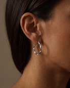 cascalia-ai earrings-385-S_lifestyle1_a1+solo.png